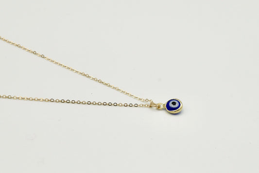 Kette NAZAR mit zartem Nazar-Auge-Anhänger aus Glas an einer 45 cm langen 14 Karat Goldfilled-Kette, handgefertigt von Femelle Anouk