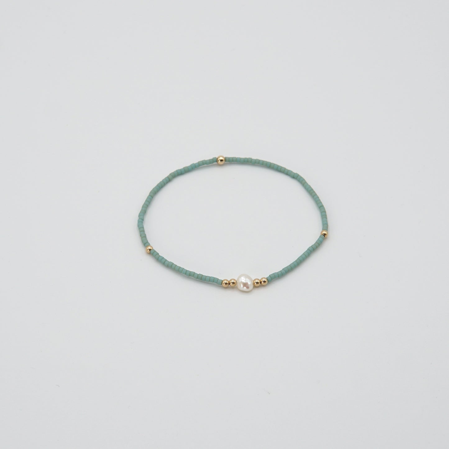 Zartes Türkises Armband 'ROSIE' mit facettierten Rosenquarz-Perlen und 14 Karat Goldfilled-Details.
