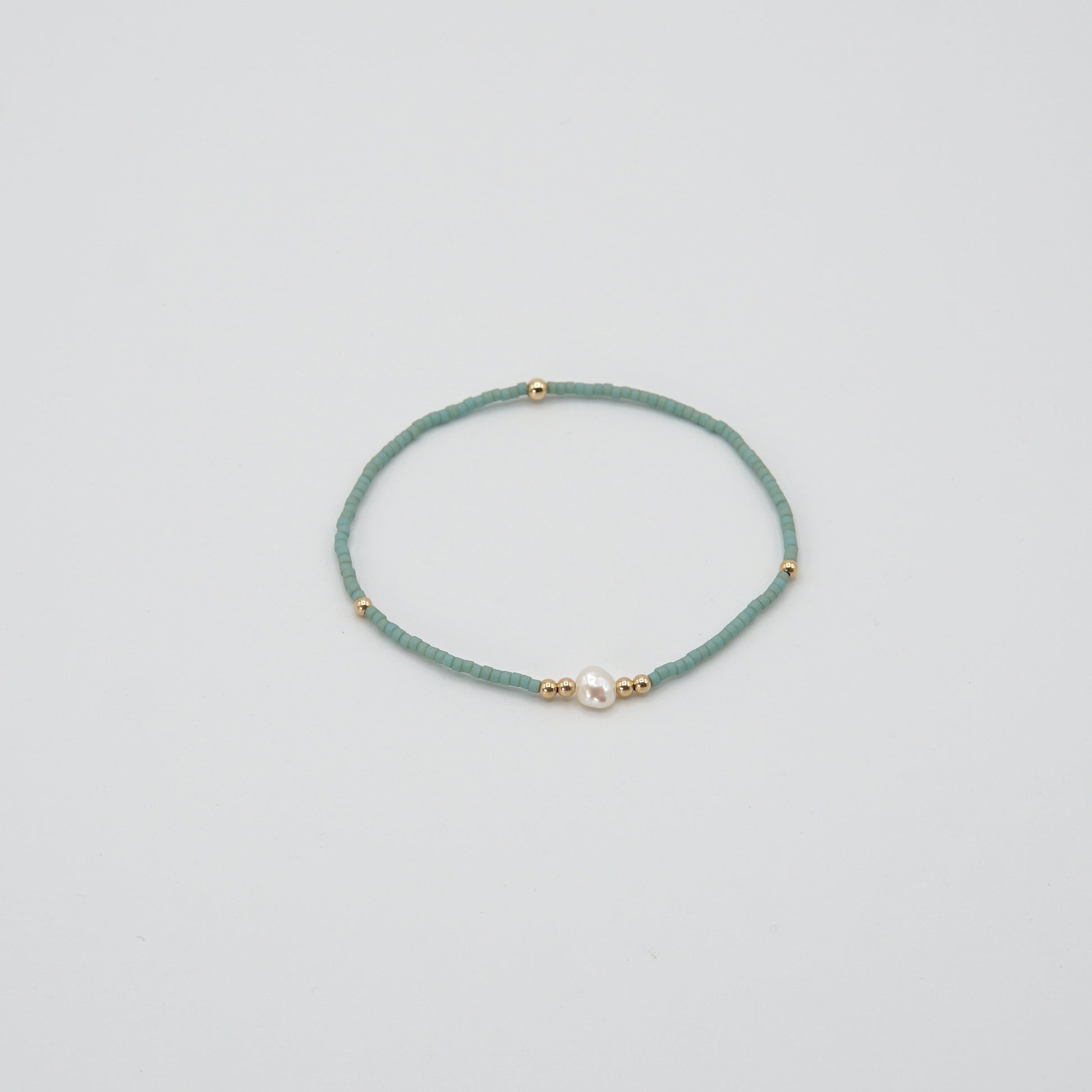 Zartes Türkises Armband 'ROSIE' mit facettierten Rosenquarz-Perlen und 14 Karat Goldfilled-Details.